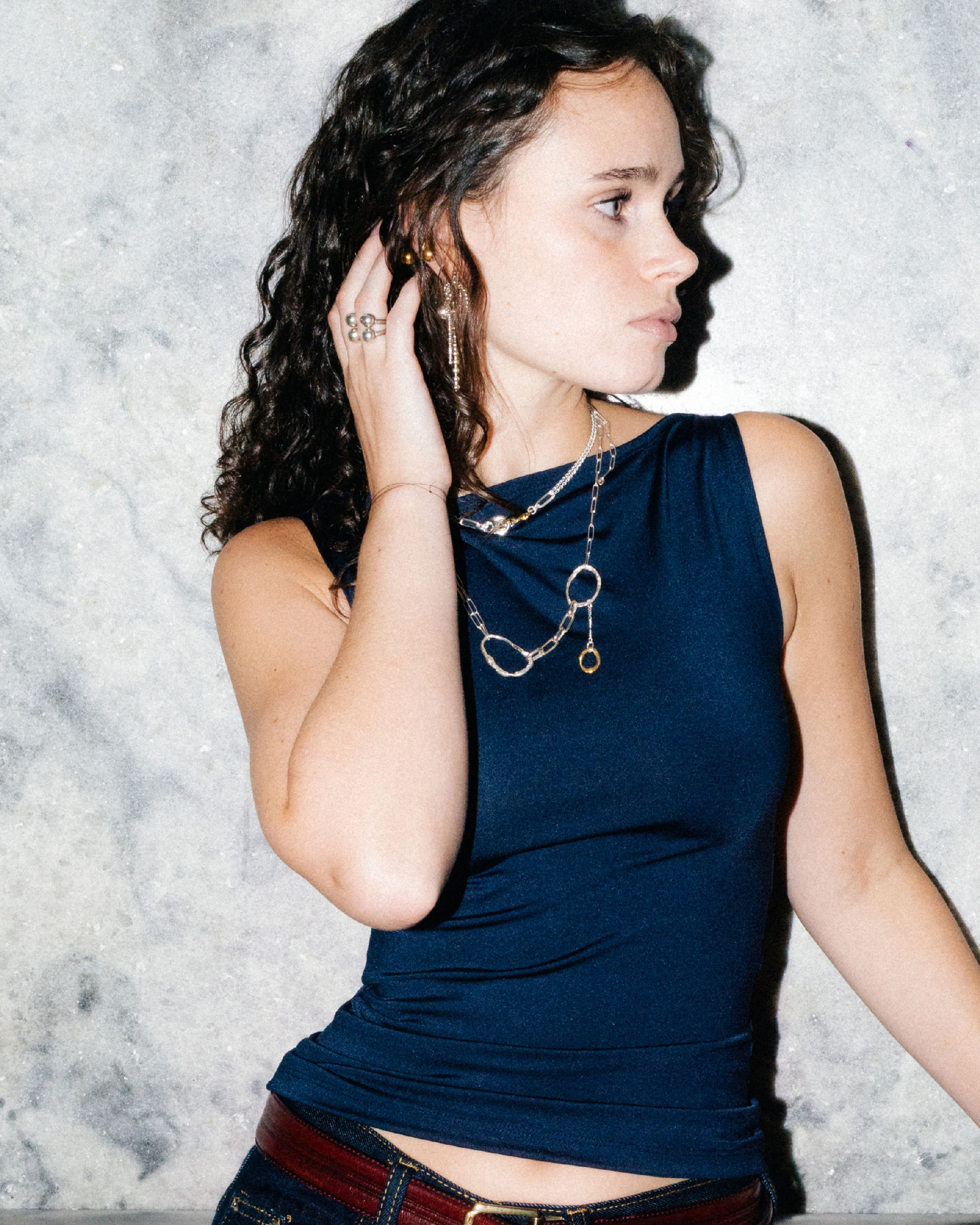 Fuyou sterling silver necklace with fluid elements and gold plated dangling detail.