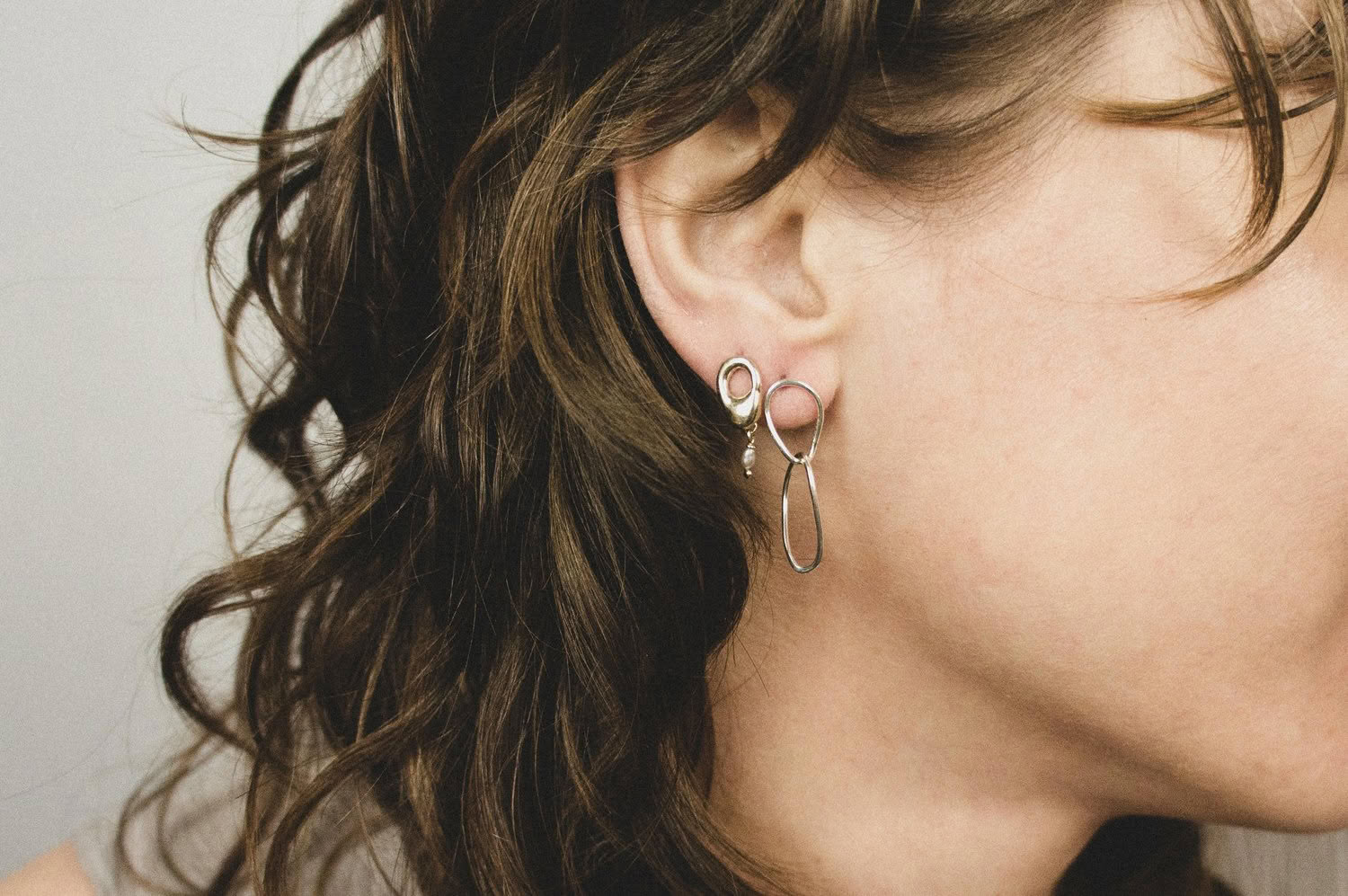 Boroboro long silver earrings. right side
