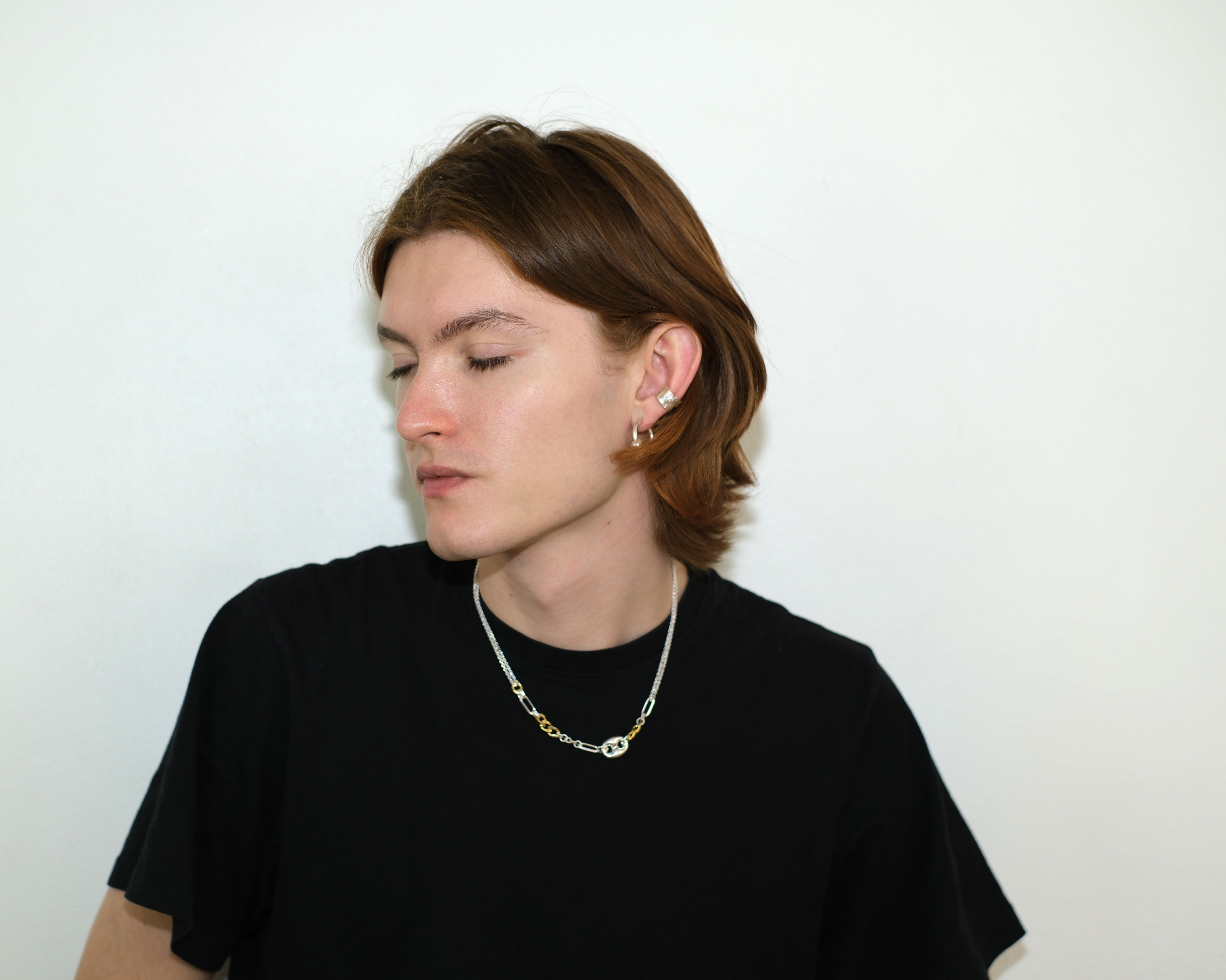 Ikkan necklace in sterling silver with some gold plated links.