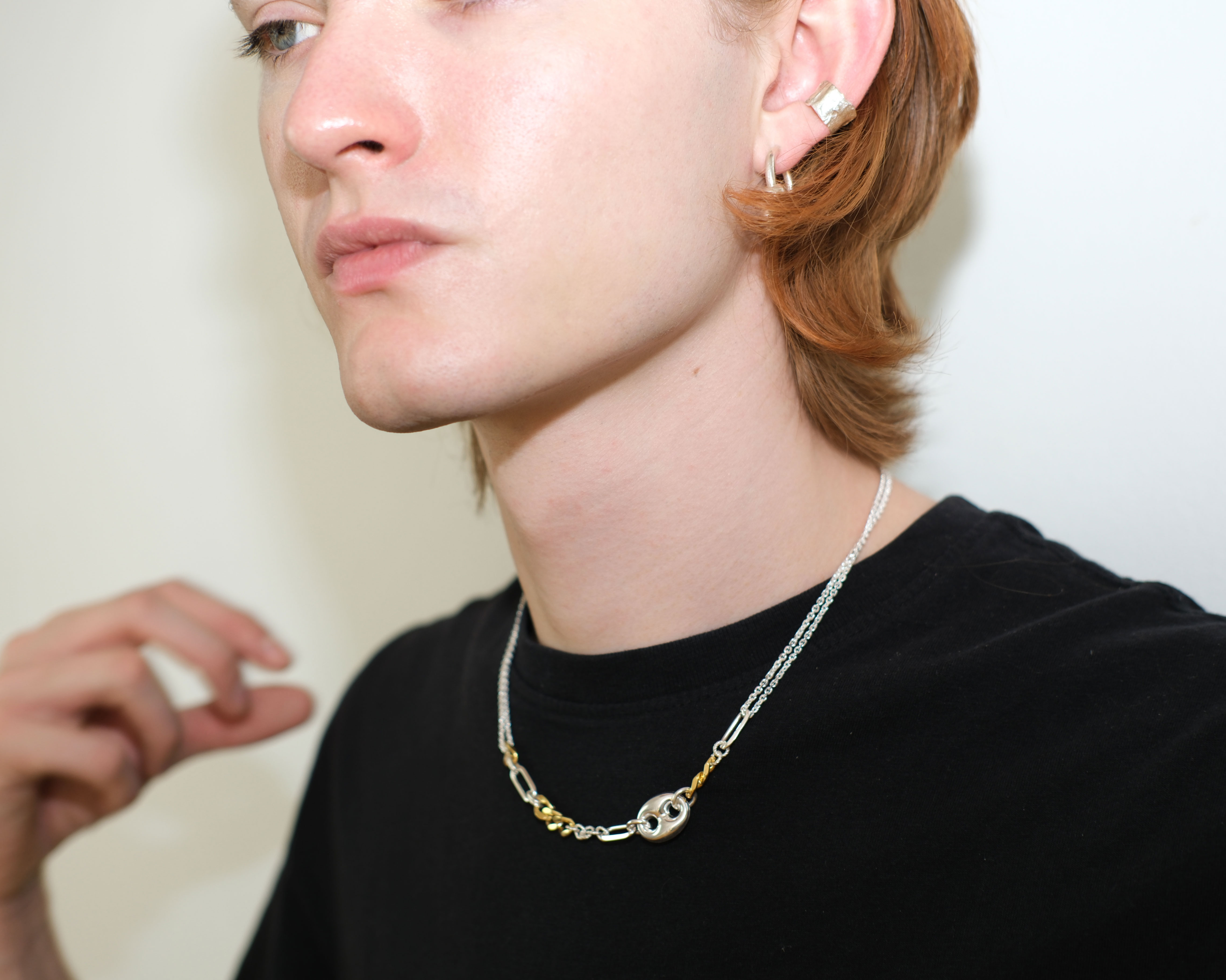 Ikkan necklace in sterling silver with some gold plated links.