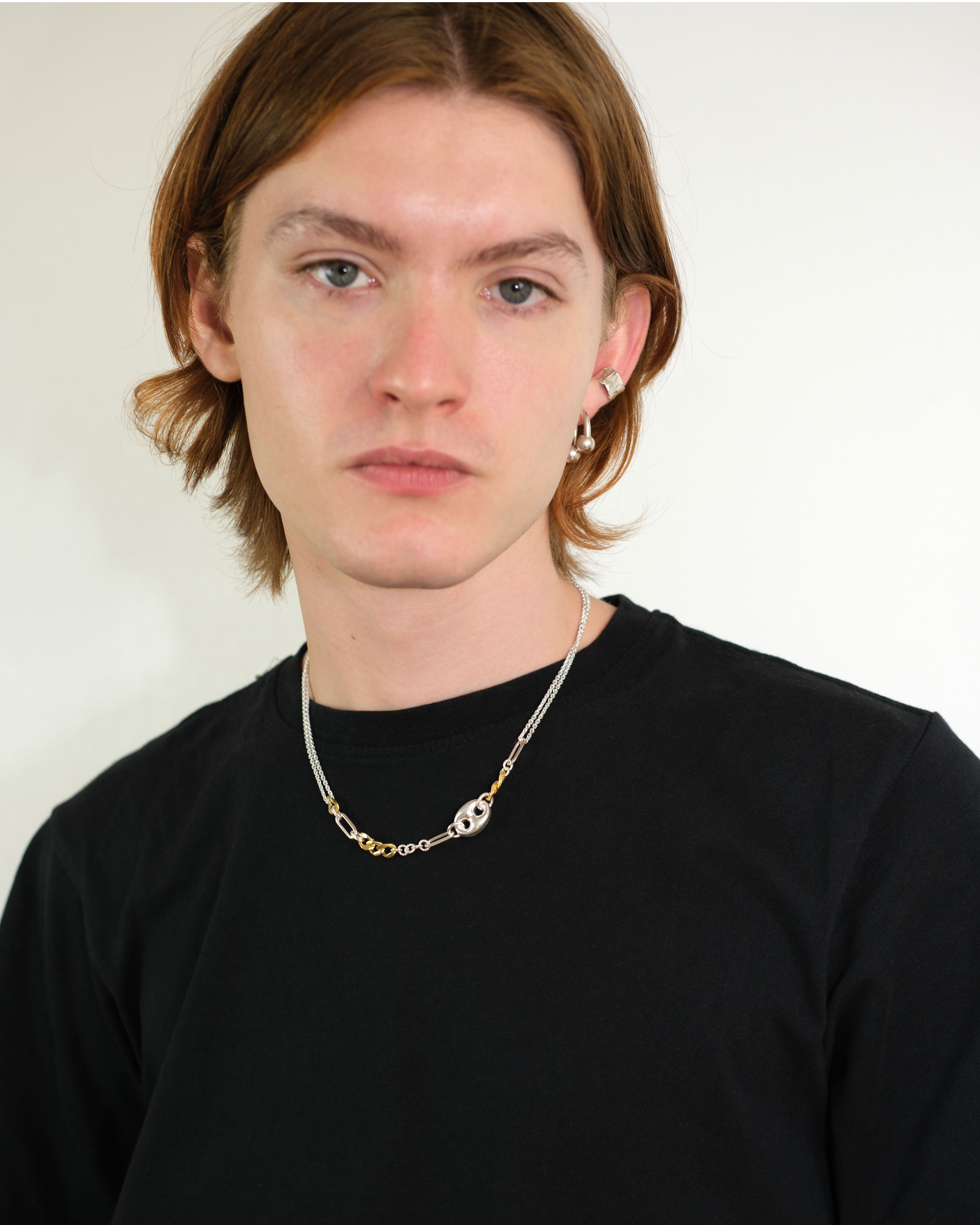 Ikkan necklace in sterling silver with some gold plated links.