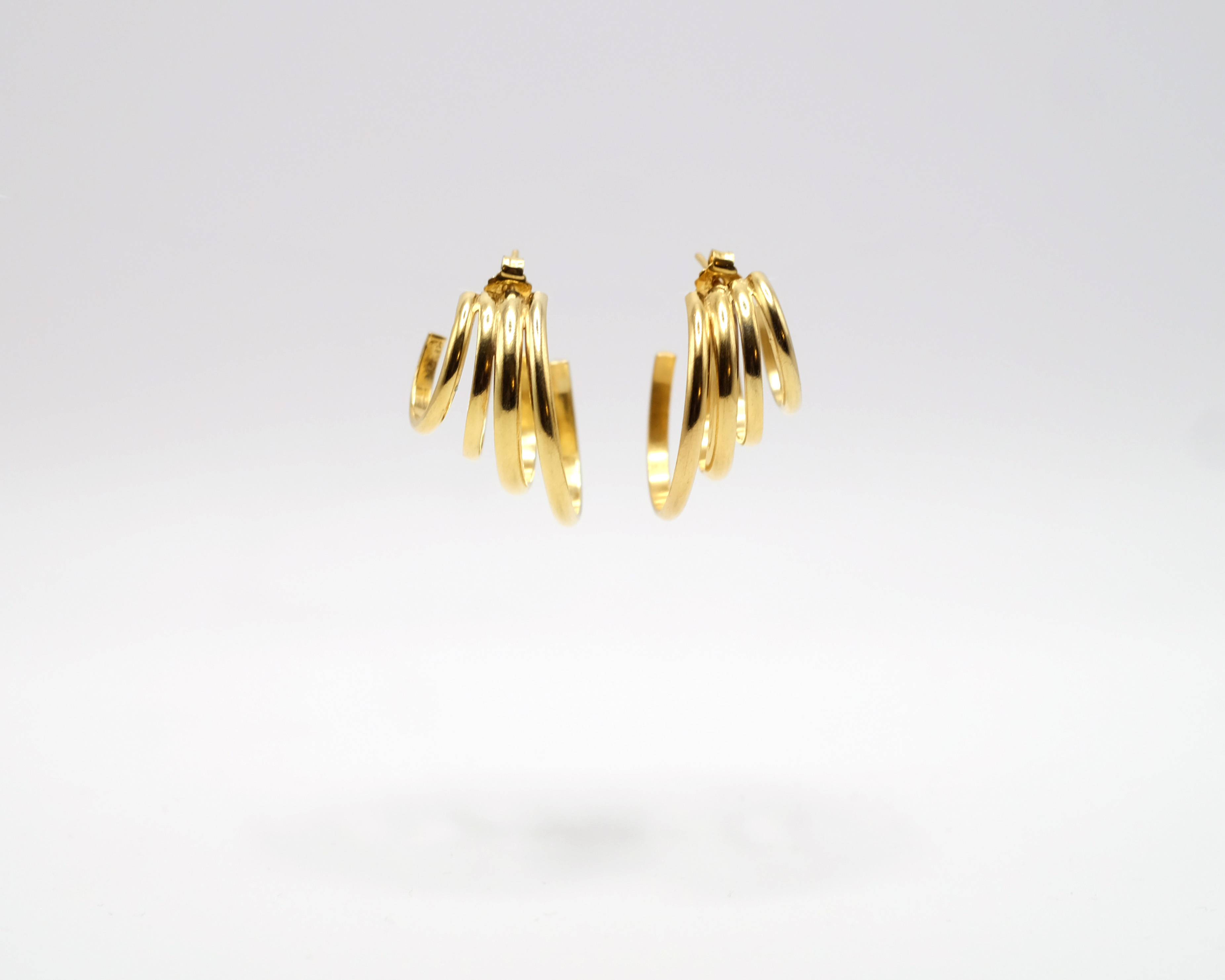 Hattari stacked hoops in gold plated silver.