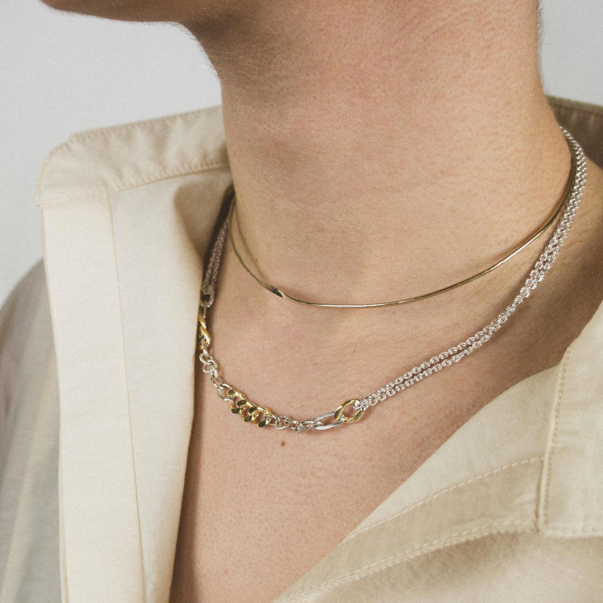 Ikkan necklace in sterling silver with some gold plated links