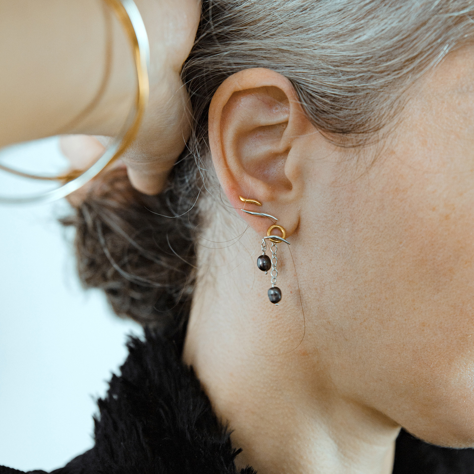 Kagun trio of earrings in mix of silver and gold plated silver, with minimalist shapes and fresh water pearls