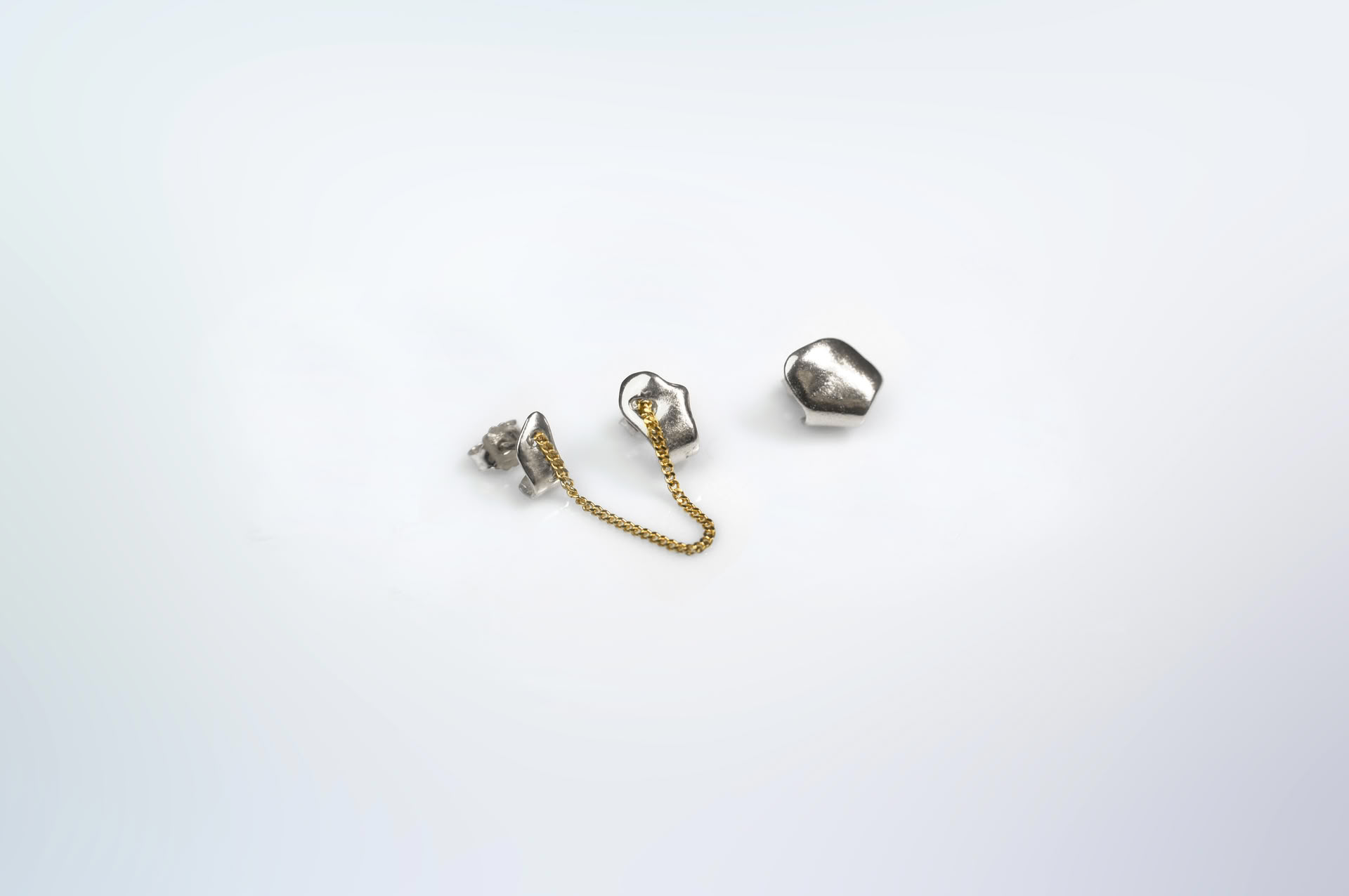 Kara trio organic shapes earrings in silver and 18k gold chain.