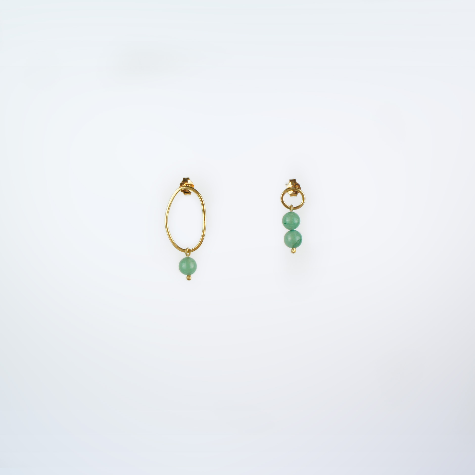 Boroboro asymmetrical gold plated silver earrings with green aventurine beads.