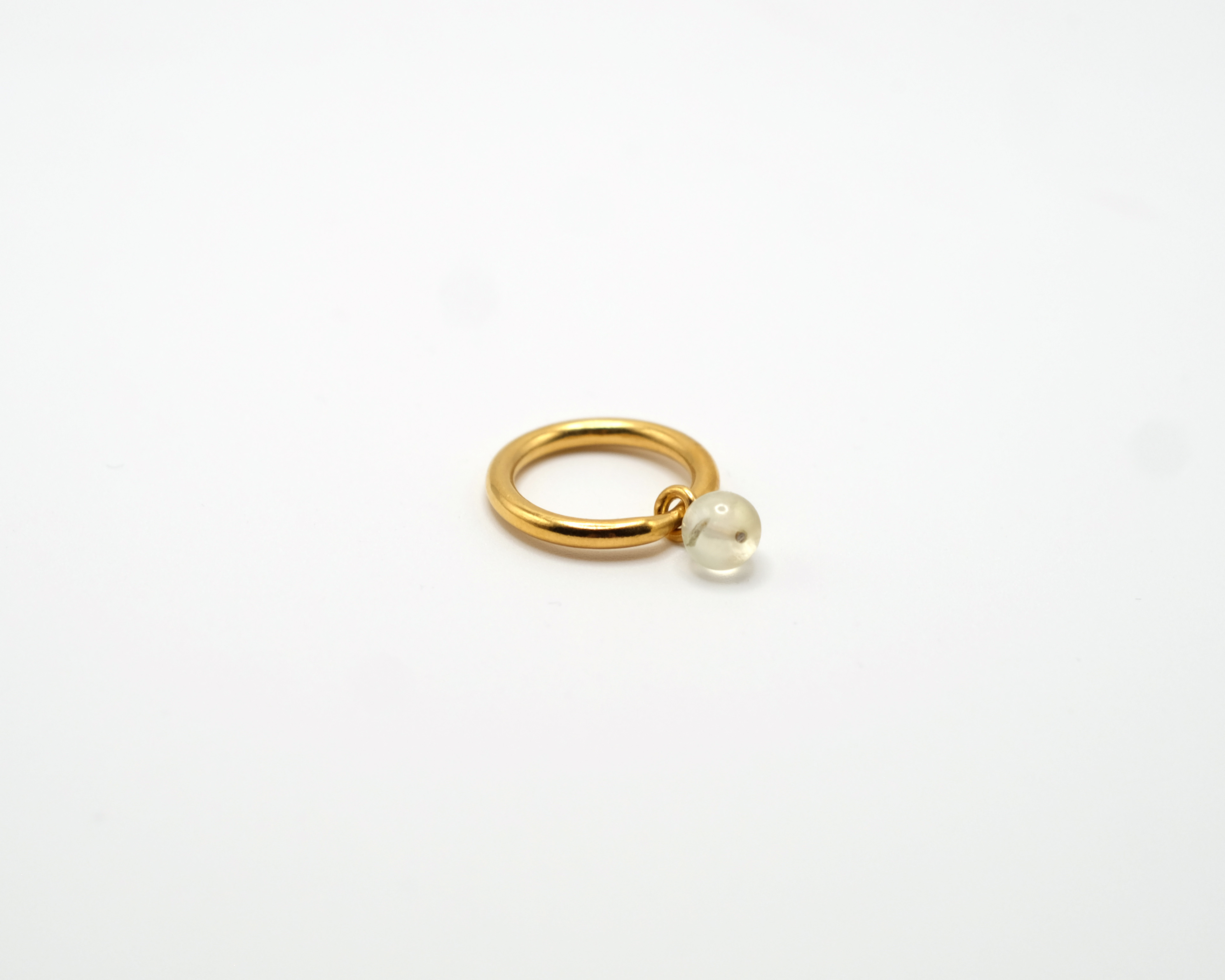 BoroBoro minimalist gold plated ring with movable prehnite bead.