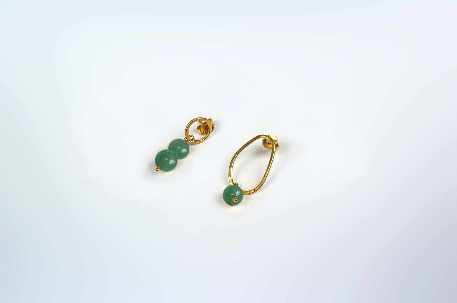 Boroboro asymmetrical gold plated bead earrings with green aventurine.