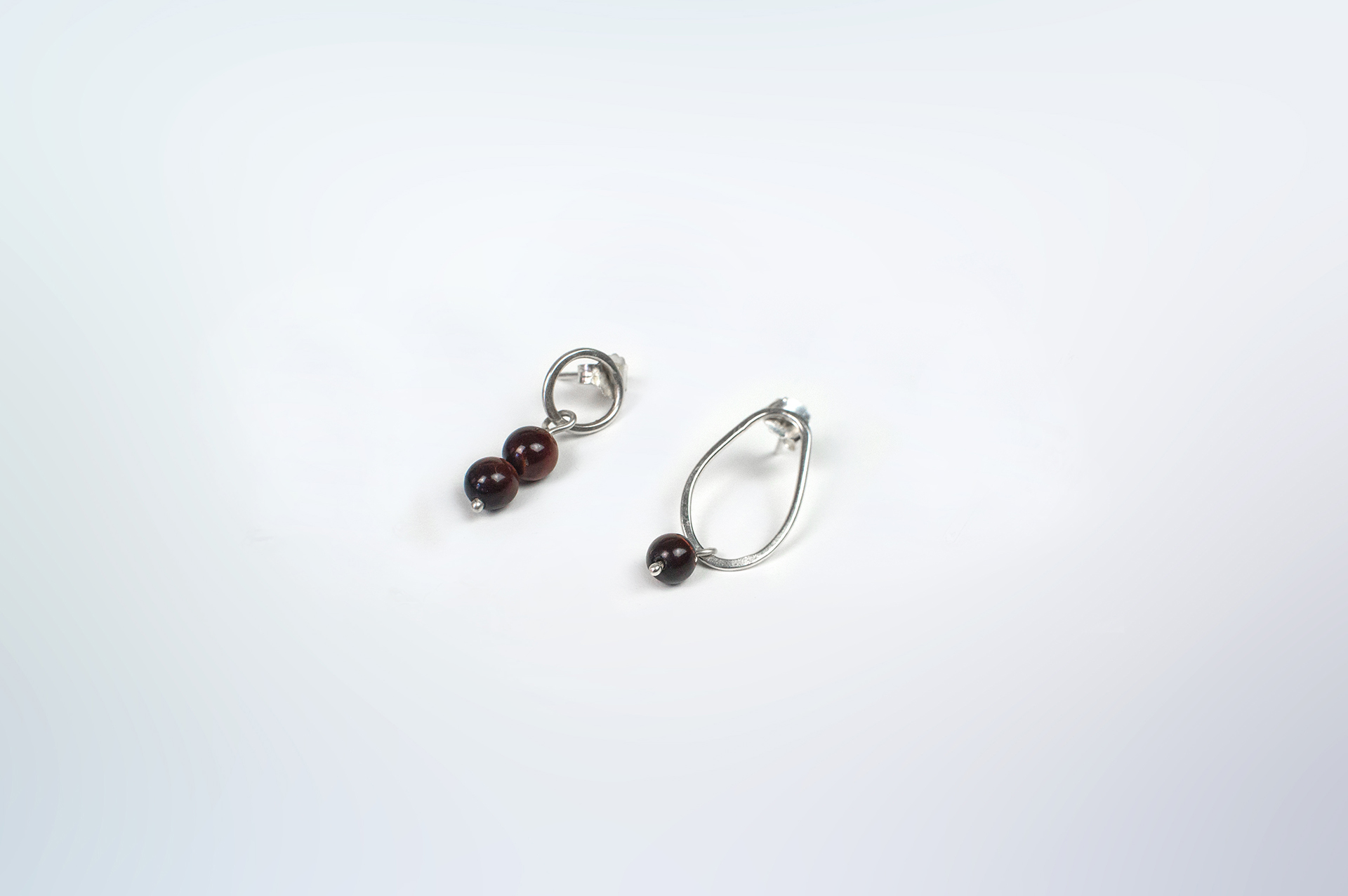 Boroboro asymmetrical silver bead earrings with tiger's eye.