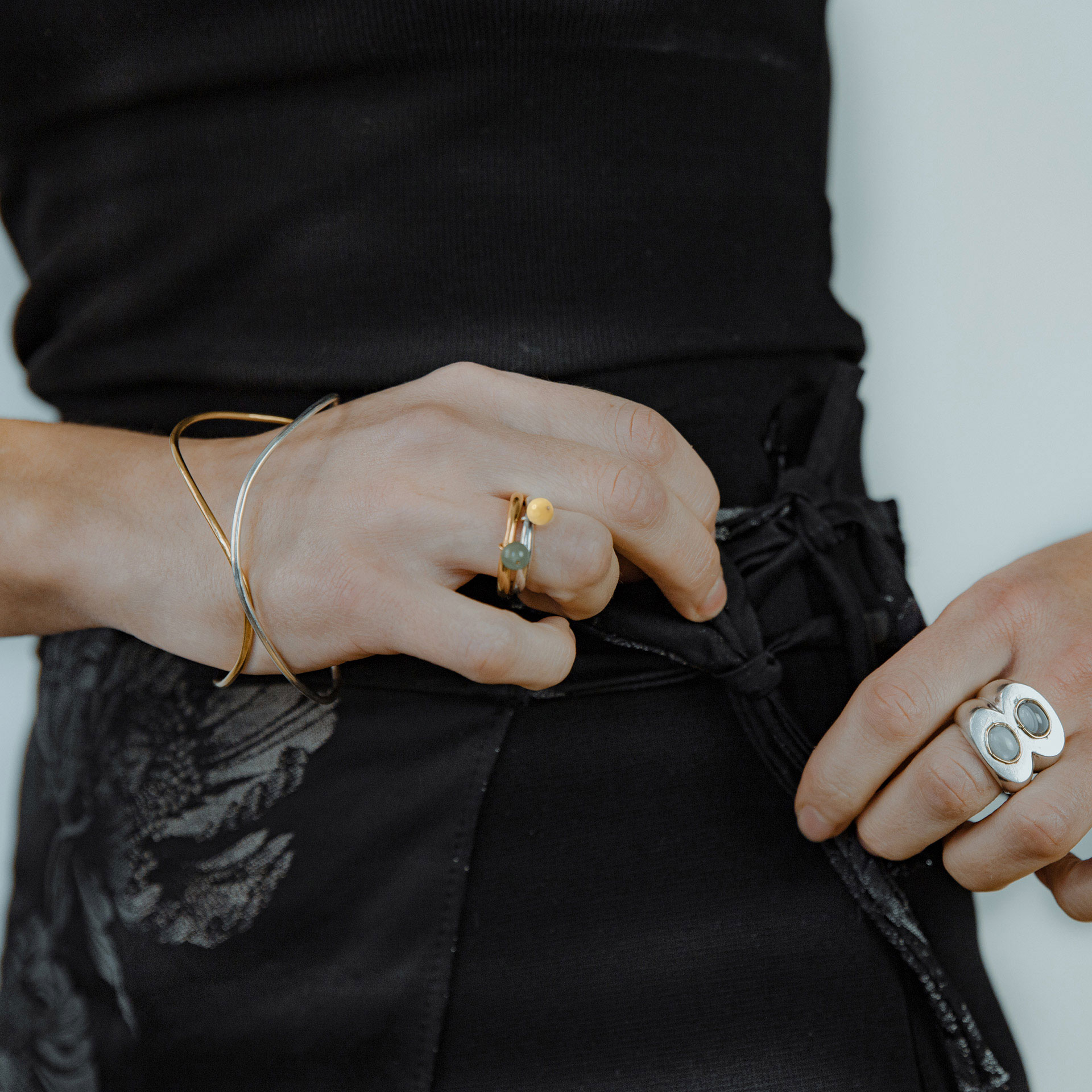 BoroBoro minimalist silver ring with movable honey jade bead.