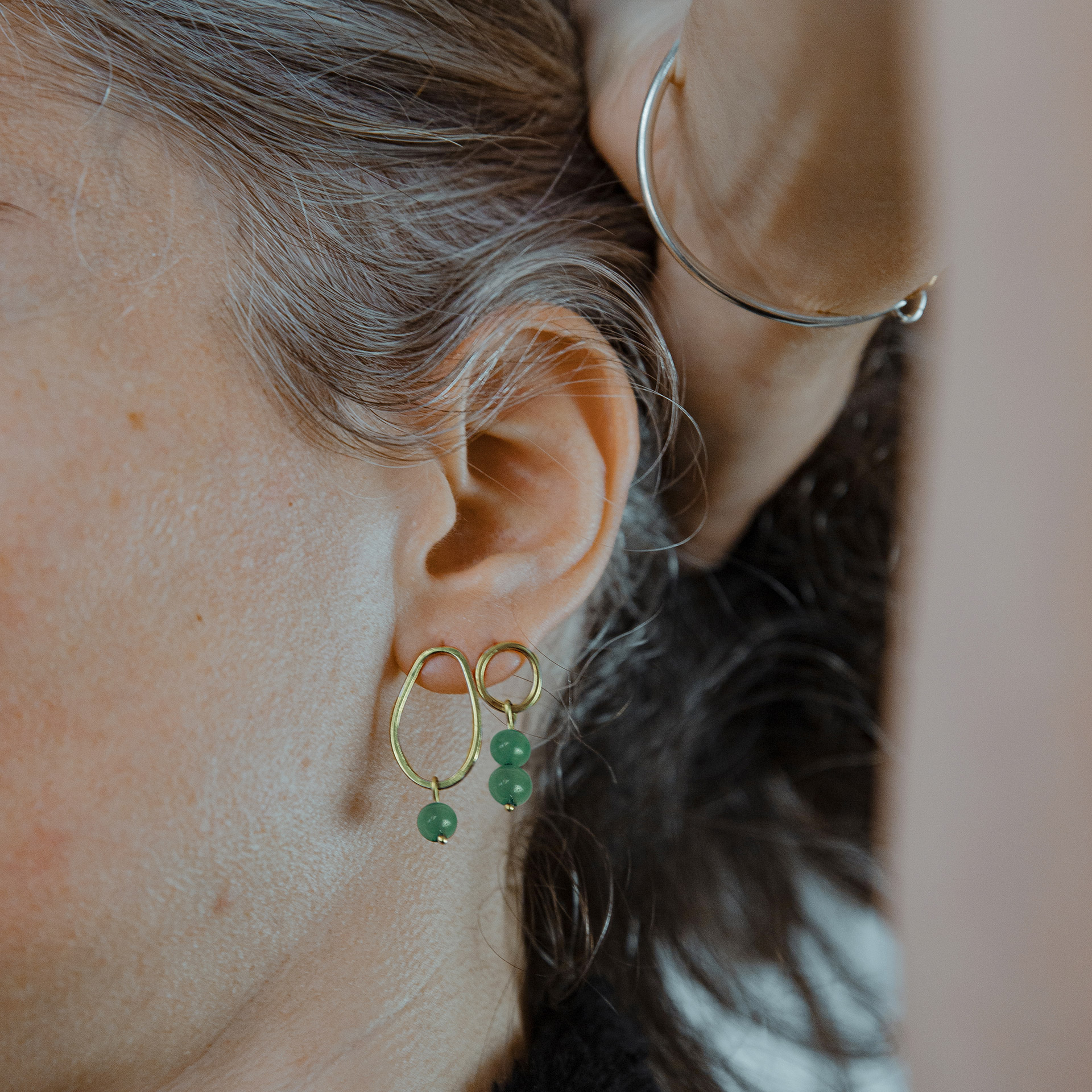 Boroboro asymmetrical gold plated bead earrings with green aventurine.