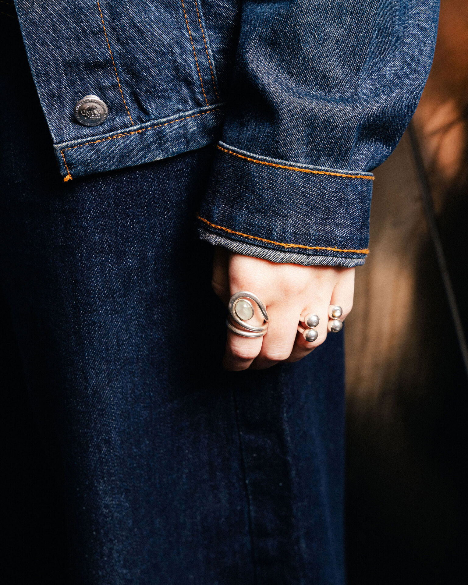 Uteki swirling ring with a prehnite oval stone. In sterling silver.