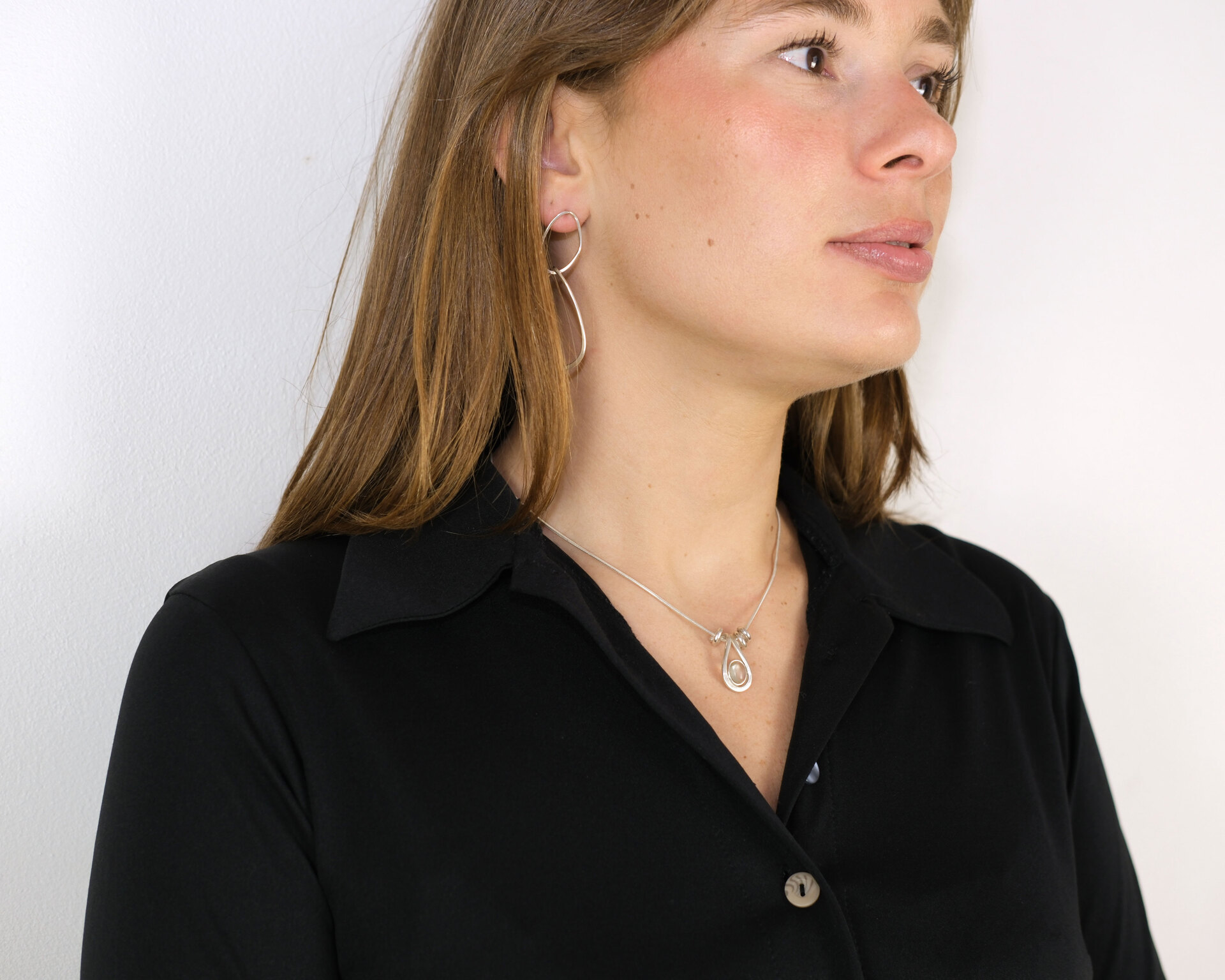 Uteki necklace with a droplet pendant and prehnite oval stone. Silver version