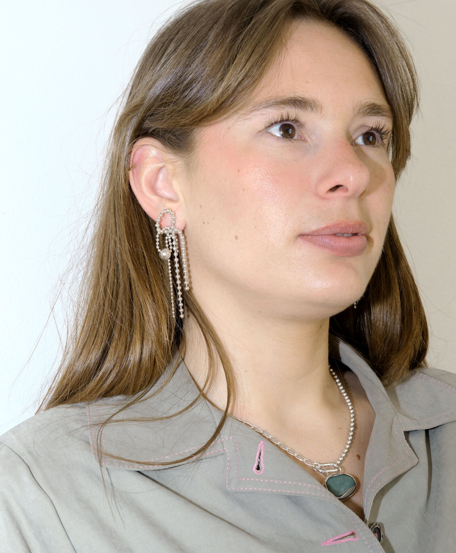 Pishi Pishi earrings made of tied ball chains in sterling silver.