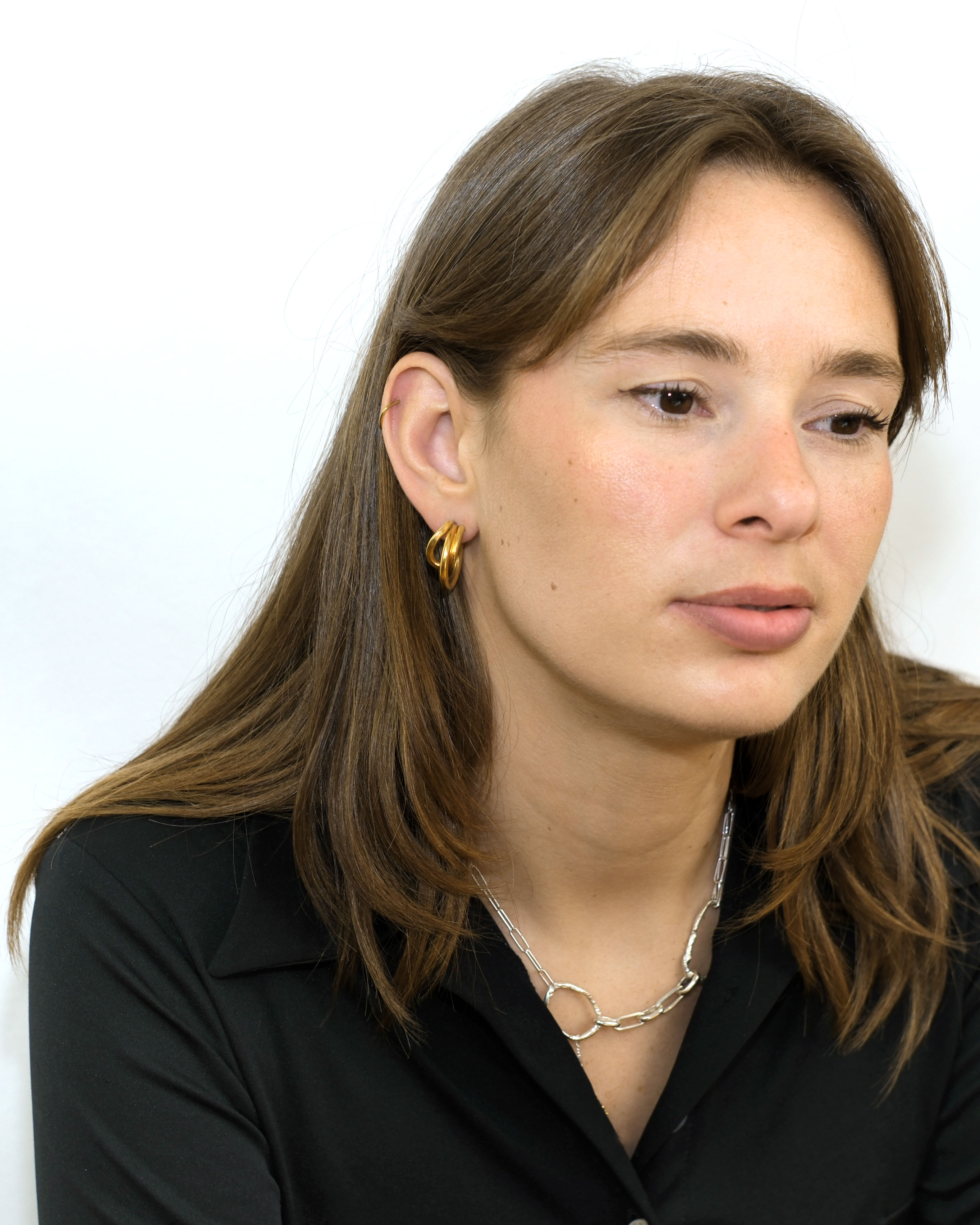 Uteki hoops with intertwined gold plated silver wire.