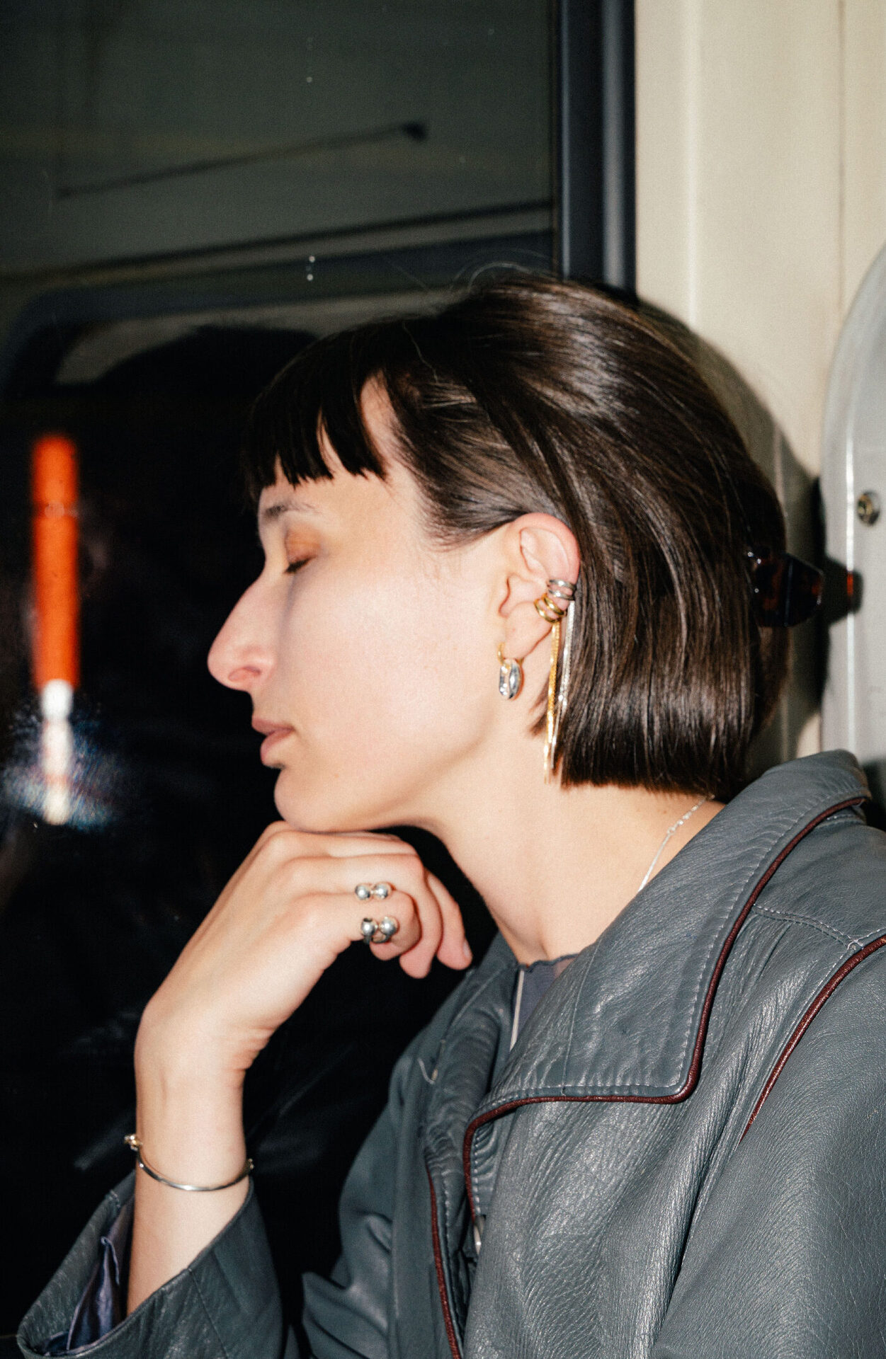 Tamanori ear cuff in sterling silver with dangling chains.