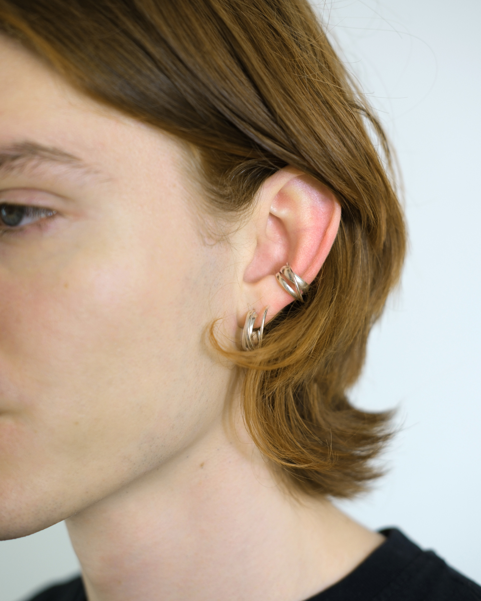 Hattari ear cuff with intertwined silver wires.