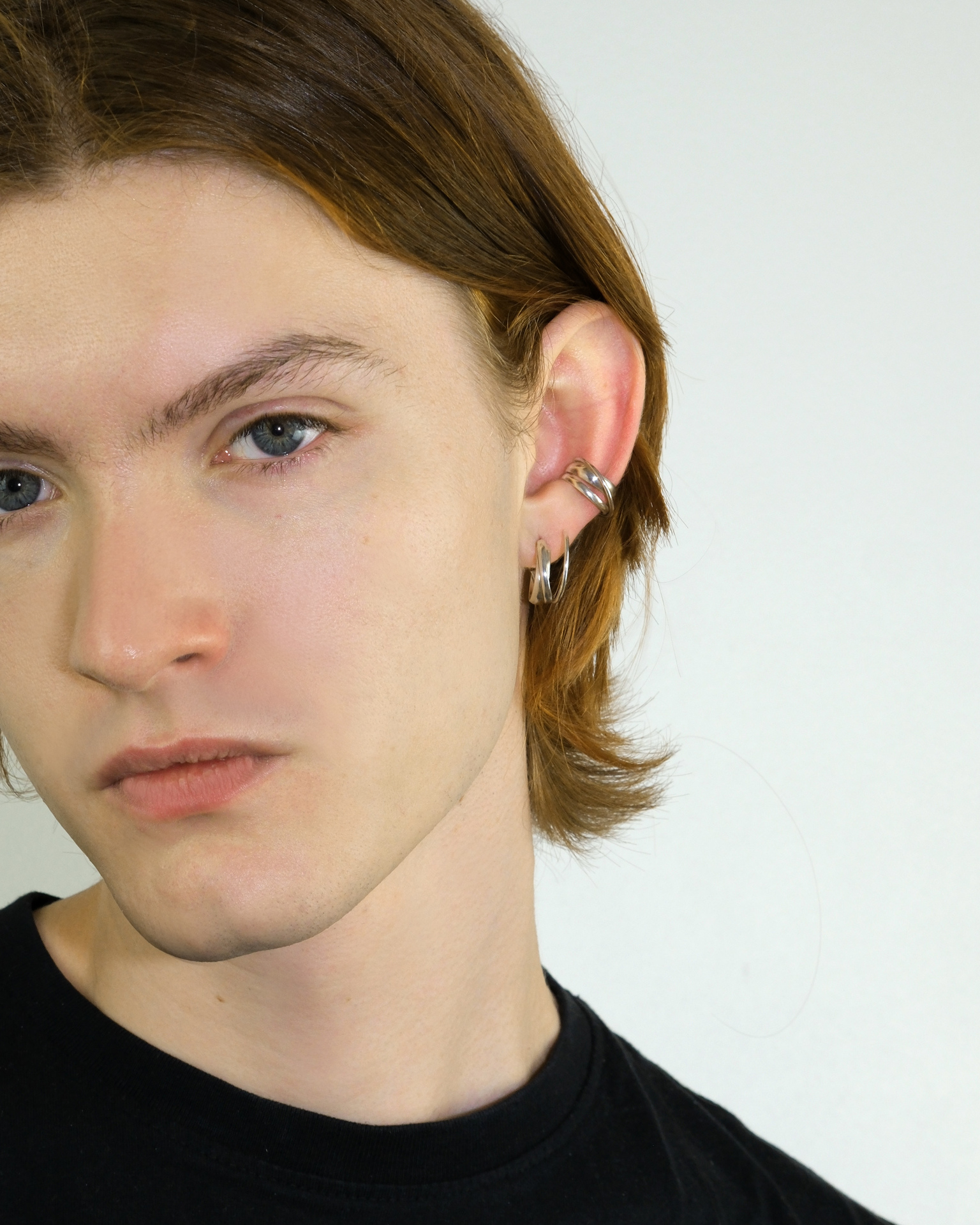 Hattari small crossed hoops in sterling silver.