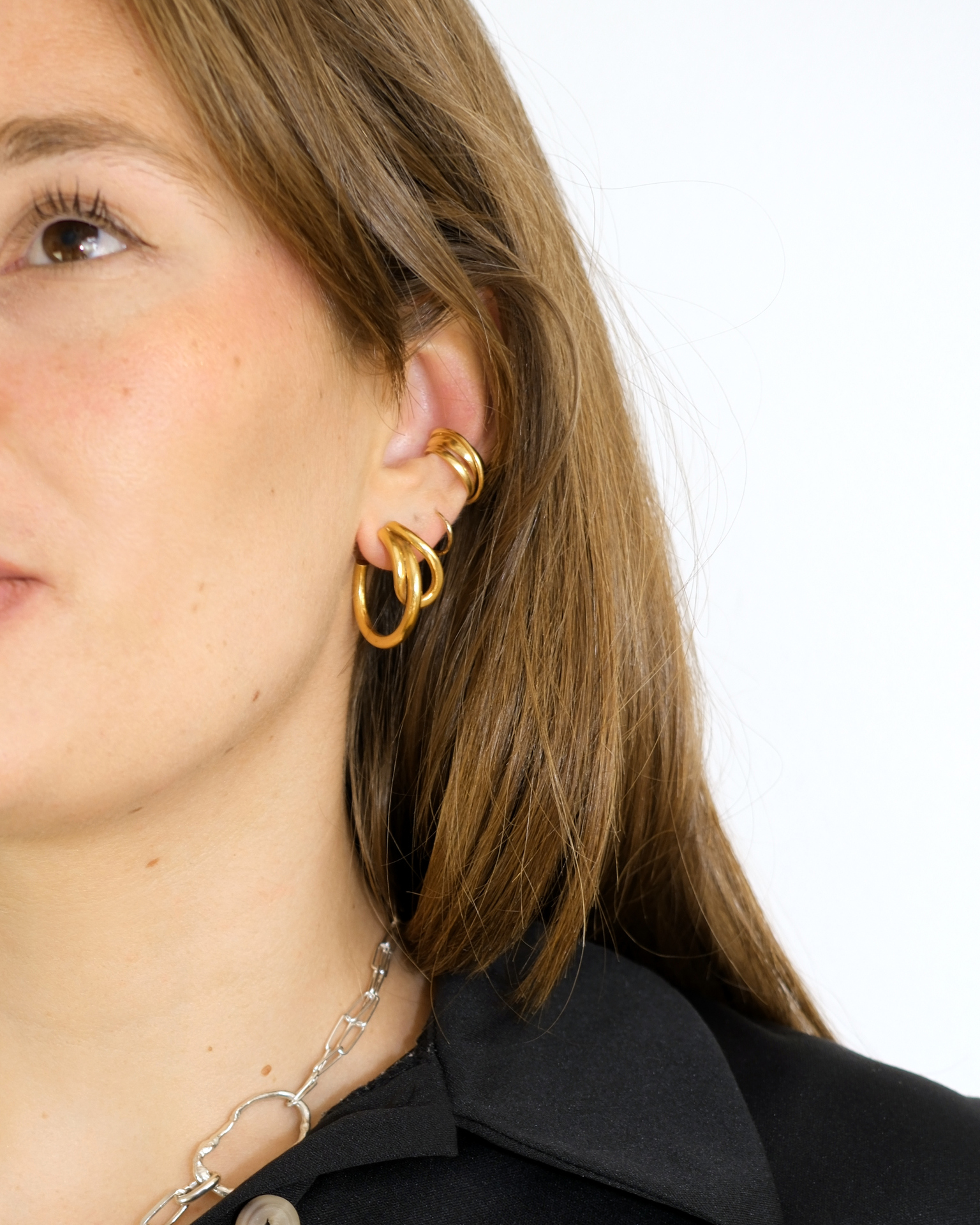 Hattari ear cuff with intertwined gold plated wires.