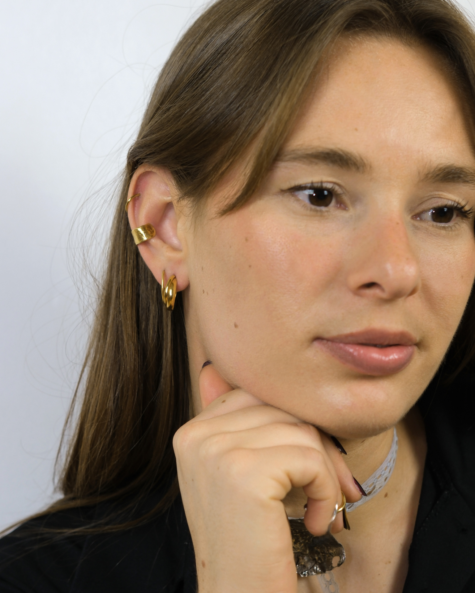 Hattari small crossed hoops in gold plated silver.